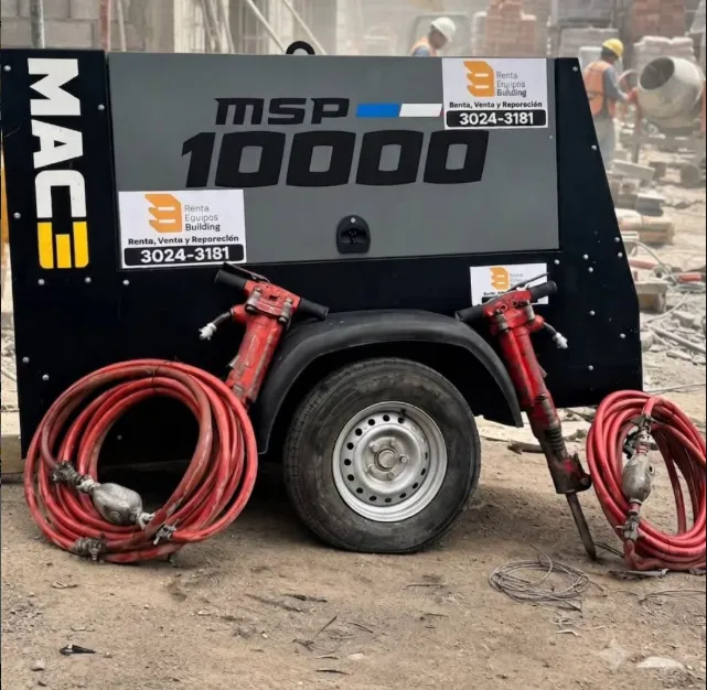 Compresor MAC MSP 10000 con martillos neumaticos en obra